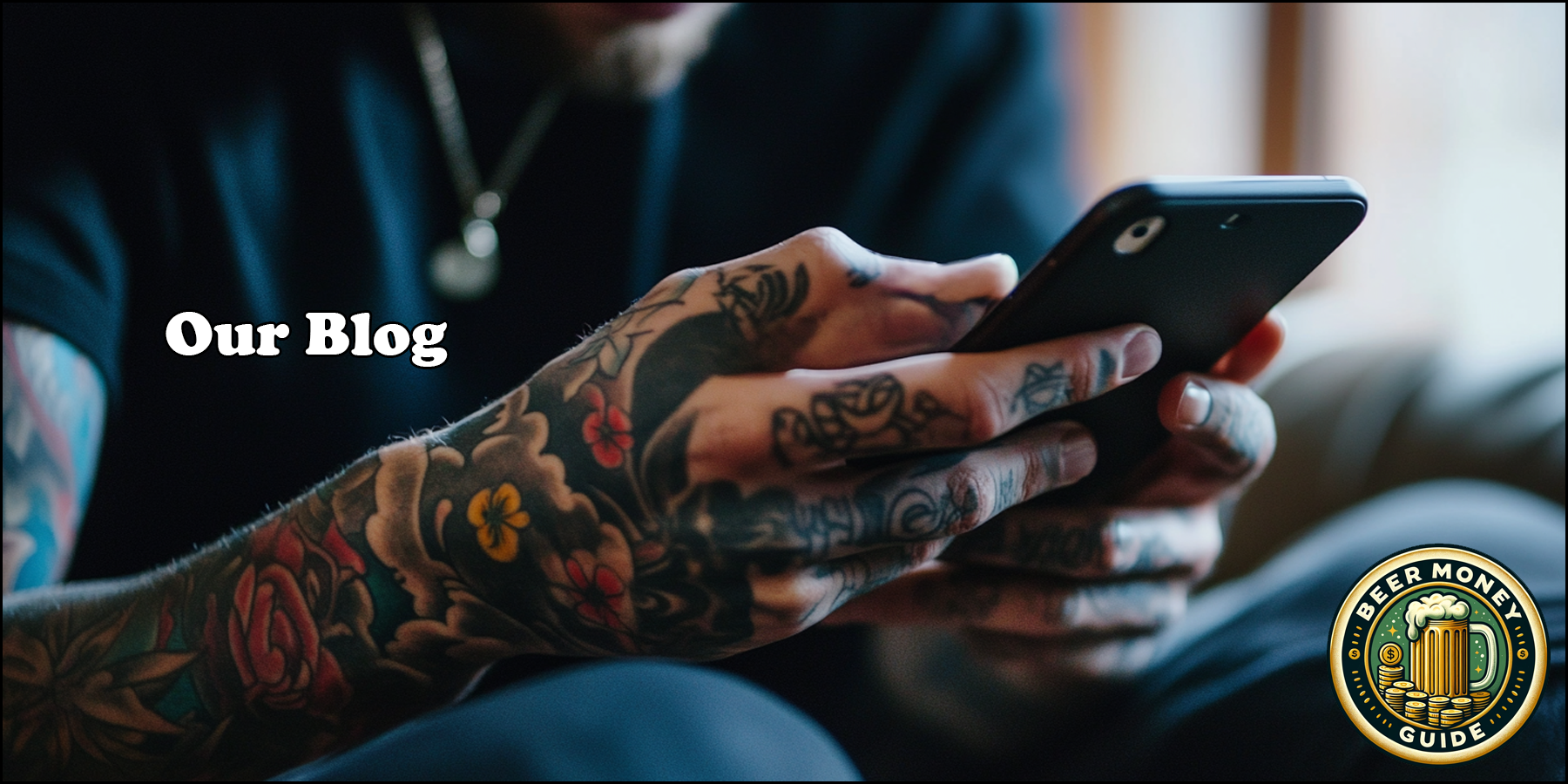 Person with tattooed hands using a smartphone. Text reads 